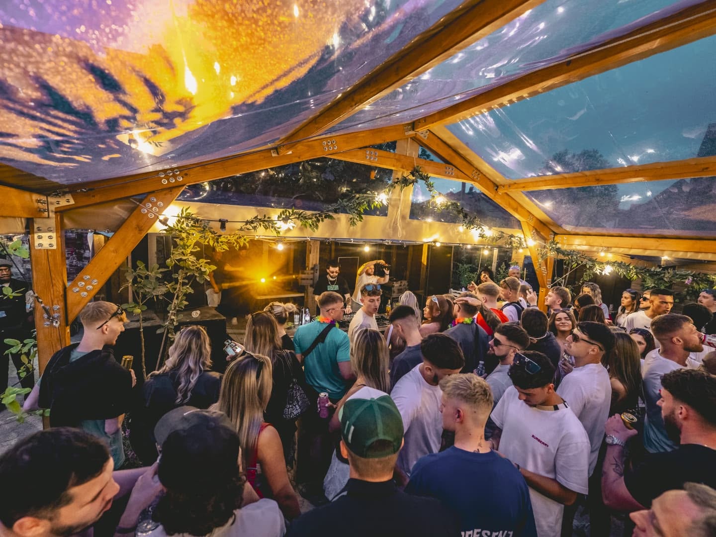 Evening event beneath the canopy with the music stage